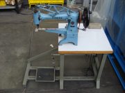 Máquina de oser de brazo SINGER con motor elétrico