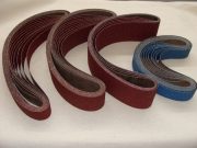 Long rough-scouring paper belts